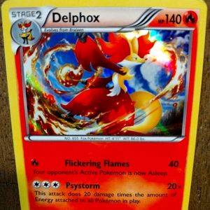 POKEMON DELPHOX 13/124 XY FATES COLLIDE RARE HOLO NEAR MINT.